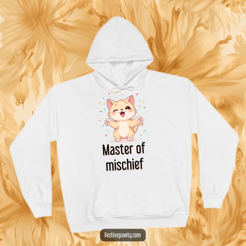 Funny cat juggling colorful confetti with its paws, on a cozy hoodie, offering warmth and a humorous design.