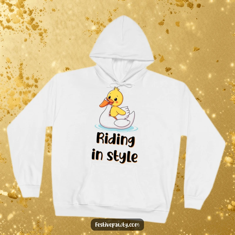 Funny Hoodie: A joyful duck rides an inflatable swan, offering cozy comfort and a splash of humorous summer delight.