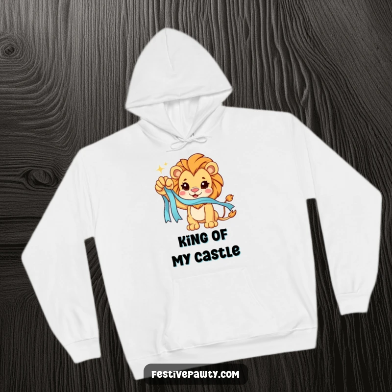 Funny Hoodie: A triumphant lion character holds a sparkling ribbon, radiating strength and a victorious spirit.