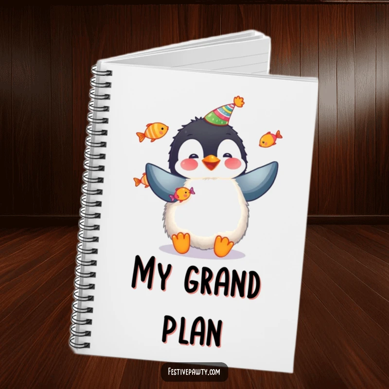 Funny penguin notebook featuring a fluffy penguin juggling fish, ideal for notes and creative ideas.