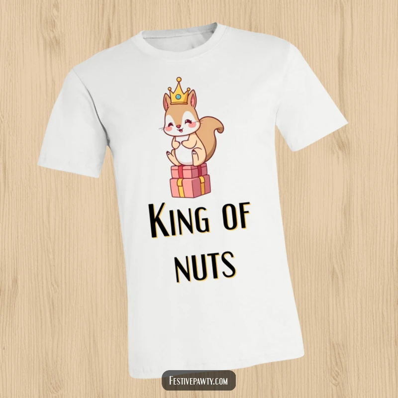 Funny Squirrel King T-Shirt: A squirrel adorned with a small crown is perched on a pile of presents, ready to spread cheer.