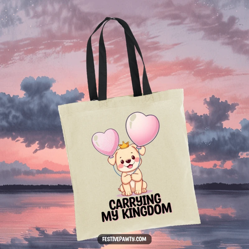 Funny Tote Bag featuring a happy puppy in a tiny crown, holding a giant glittering balloon, exuding happiness and regal charm.